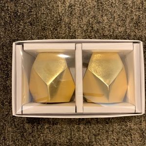 Gold salt and pepper shakers. From At Home.